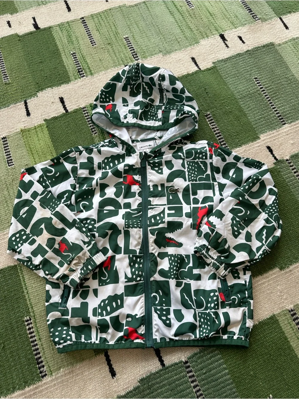 Lacoste Green and White Hooded Windbreaker with Subtle Red Detail